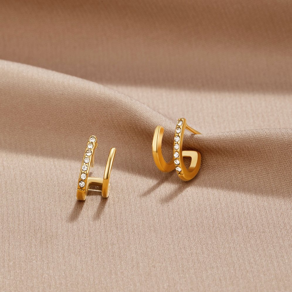 Boucles griffes – Or et cristaux scintillants