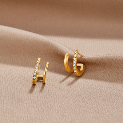 Boucles griffes – Or et cristaux scintillants