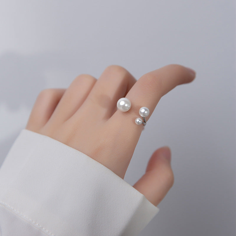 Bague en perles d'eau douce triple ajustable