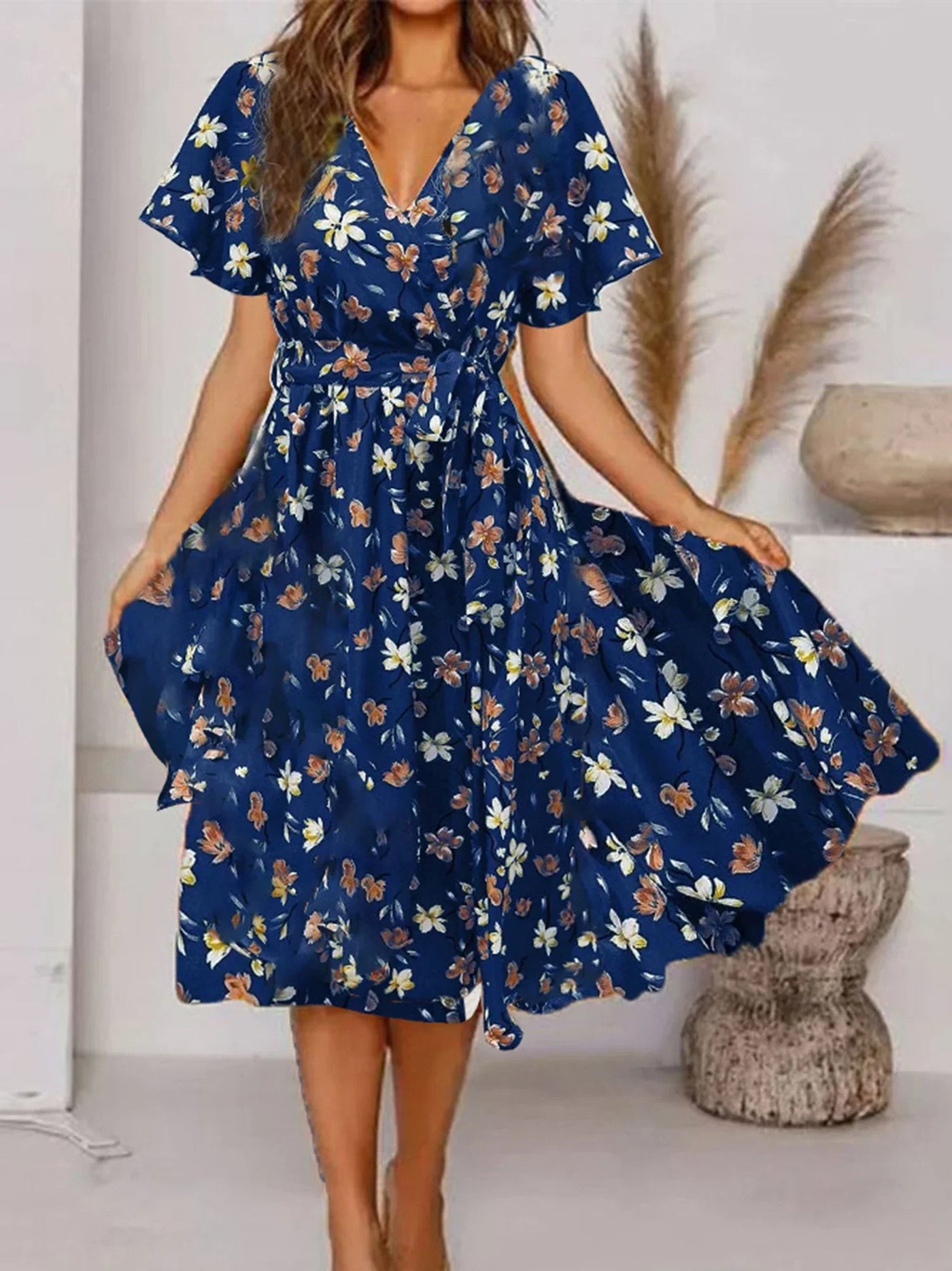 Evy | Robe midi élégante avec imprimé floral romantique