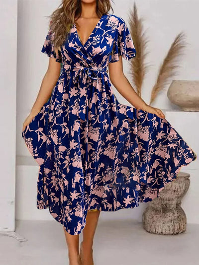 Evy | Robe midi élégante avec imprimé floral romantique