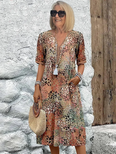Helen | Robe maxi élégante avec imprimé floral ludique