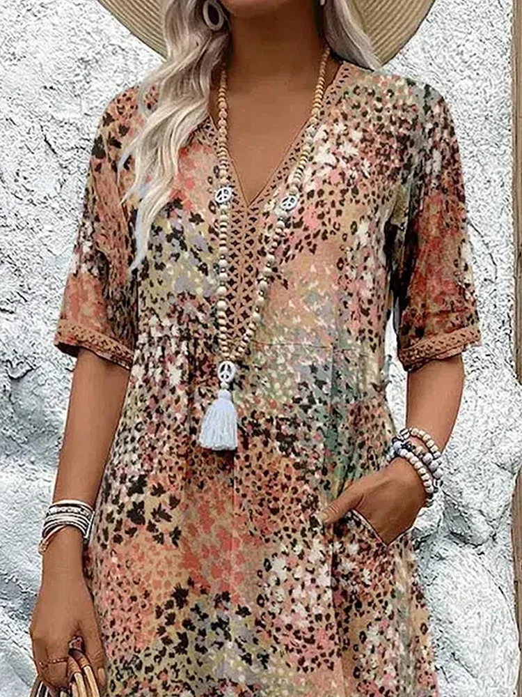 Helen | Robe maxi élégante avec imprimé floral ludique