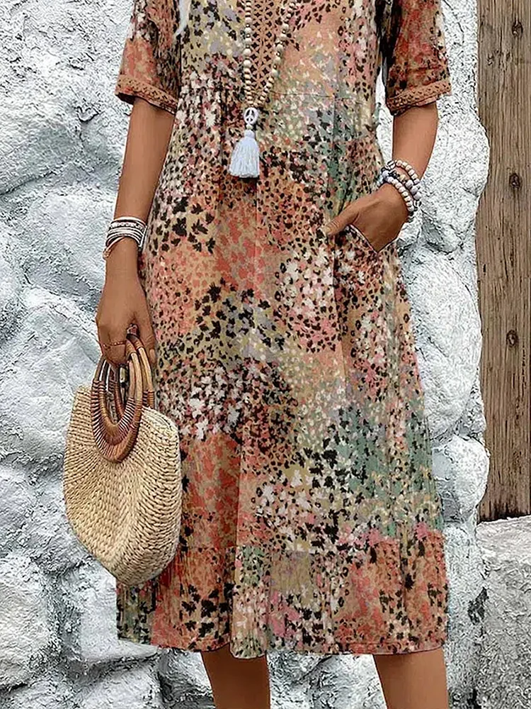 Helen | Robe maxi élégante avec imprimé floral ludique