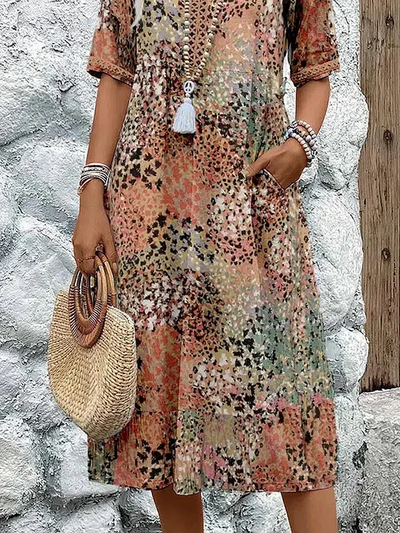 Helen | Robe maxi élégante avec imprimé floral ludique