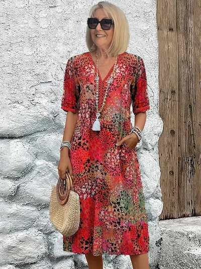 Helen | Robe maxi élégante avec imprimé floral ludique