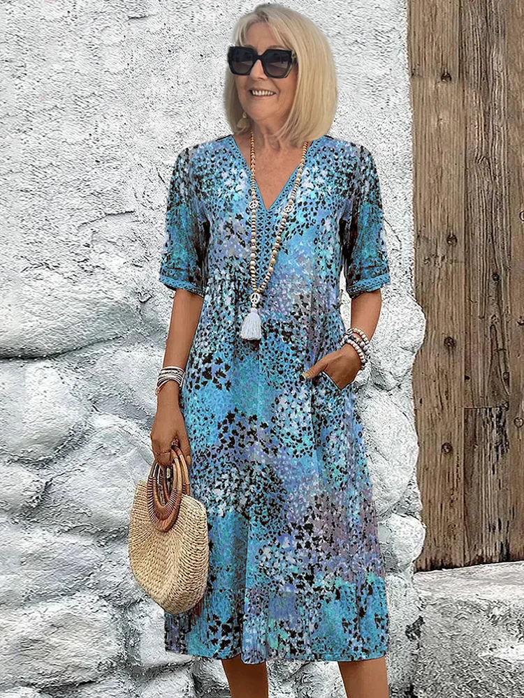 Helen | Robe maxi élégante avec imprimé floral ludique