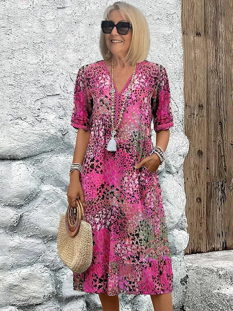 Helen | Robe maxi élégante avec imprimé floral ludique