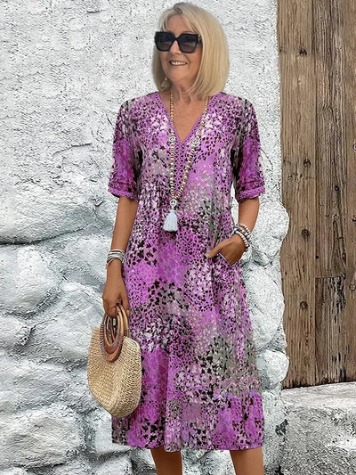 Helen | Robe maxi élégante avec imprimé floral ludique